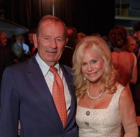 Annabel Bowlen and Pat Bowlen pose for a picture.